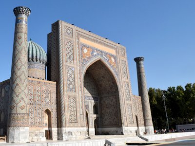 Highly decorated traditional building Sher-Dor Madrasah, Registan Square, Samarkand, Uzbekistan