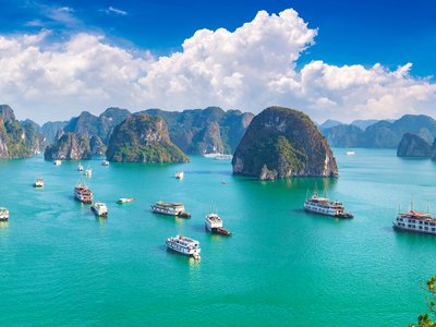 Panorarmic view of Halong Bay, Vietnam, and the karst limestone pinnacles rising from the sea