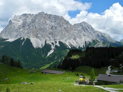 Seebenalm mountain cabin in Ehrwald with mountain in background, Austria
