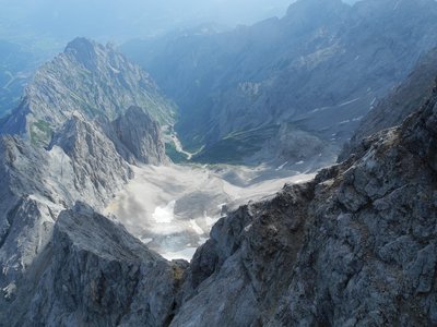 Top down view of mountain ridge descent revealing Zugspitz Glacier, Austria