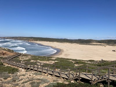 Wooden stair path down to beach on Rota Vicentina trail, Portugal