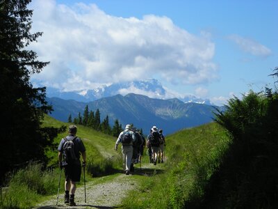 Group of walkers on path with Zugspitze view, Germany