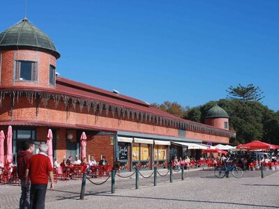 People standing outside the Mercados de Olhao, Portugal