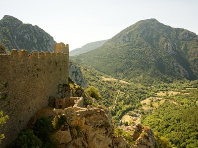 Ruins of the Puilaurens castle with mountains in background, Cathar country