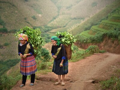Hmong women are on the path to their village in Sapa, Vietnam