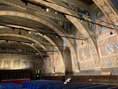 Palazzo dei Priori former council chamber Sala dei Notari interior with historical artwork decorating every wall, Perugia, Italy