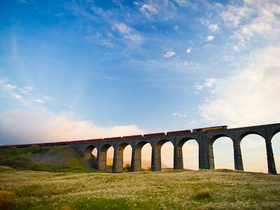 Train crossing Ribblehead Viaduct, valley of River Ribble, Ribblehead