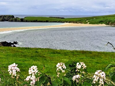 Sand tombolo (causeway) to St. Ninian's Isle on the southwest coast of main Shetland island, northeast of Scotland, United Kingdom