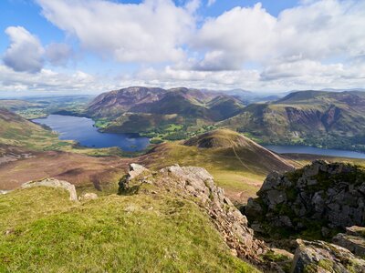 Views of Lake Buttermere and Crummock Water on route to the summit of Red Pike with Wandope, Whiteless Pike, Grasmoor and Robinson in the distance