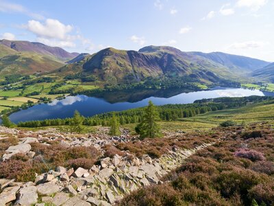 Lake Buttermere on route to the summit of Red Pike with Wandope, Robinson, Dale Head and Fleetwith Pike in the distance. The English Lake District, UK
