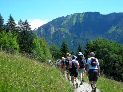 Group walking along mountain path, Bavaria, Germany