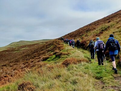 Line of hikers walking along hillside, Abbey Brook, Derwent Edge.jpg