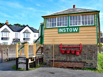 Old railway signal box, the railway, now disused forms the Tarka Trail cycle and walking route, Instow, North Devon, England
