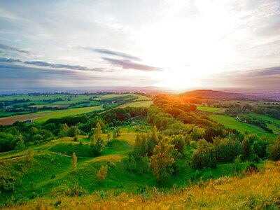 A beautiful sunset, in summer looking towards the Royal Forest of Dean from Painswick Beacon, Cotswolds, Gloucestershire, UK