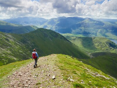Hiker descending from Grasmoor near Buttermere, Lake District