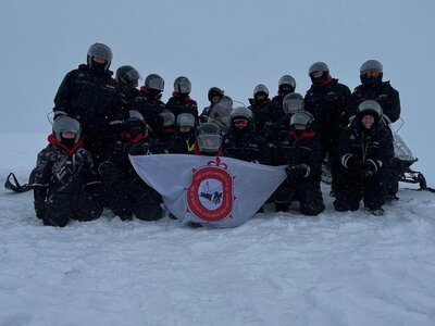 Students, teachers and helpers from Sherbourne School on an expedition in Svalbard