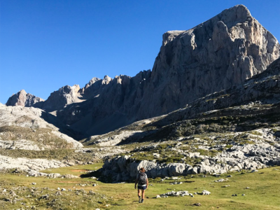 Ramble Worldwide walking holiday leader Al Sargeant walking in Picos De Europa above Fuente De, Spain