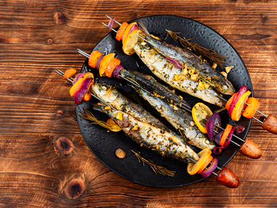 Grilled sardines on skewers