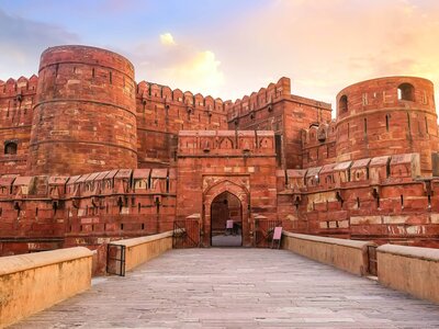 Agra Fort - Historic red sandstone fort of medieval India at sunrise, a UNESCO World Heritage site in the city of Agra, India