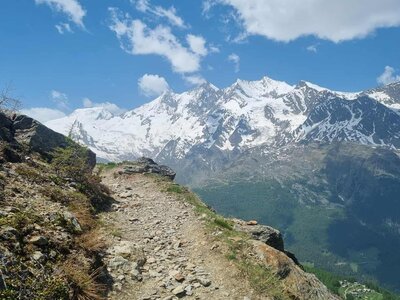 Saas valley walking trail with mountainous view, Switzerland