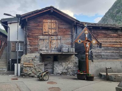 Traditional raised swiss house in saas almagell, Switzerland