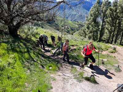 Group hiking up trail in Gran Canaria, Canary Island, Spain