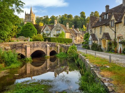 Traditional stone houses in Castle Combe, a popular tourist destination and one of the most beautiful villages in Cotswolds region, England
