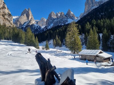 Wooden hut and mountains, St zyprian in the dolomites, Italy