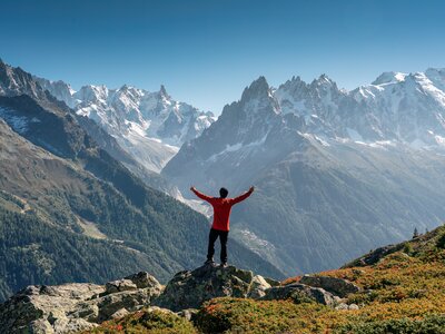 Walker celebrating in the mountains of the French Alps
