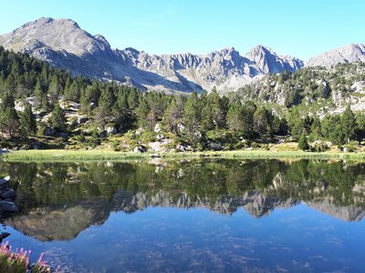 Pessons Lakes with mountain landscape reflection, Andorra