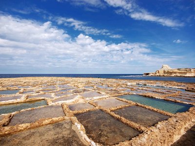 Salt Pans in Qbajjar Bay, Gozo Island in the Mediterranean Sea